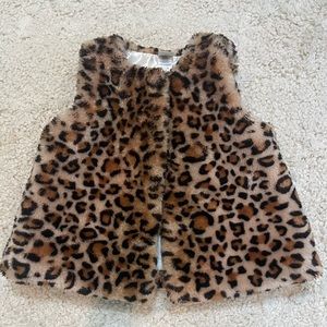 Furry leopard vest, with buttons to close. So cute!